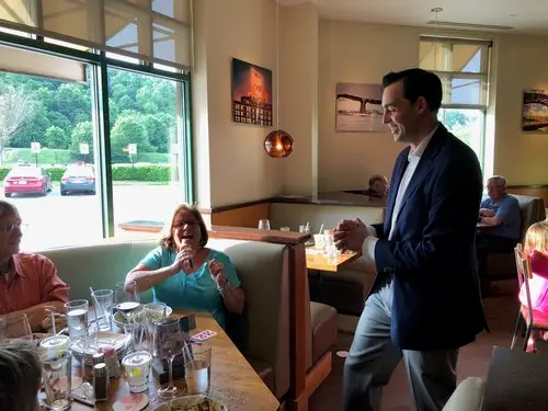 Adam performs amazing magic tricks for an adult woman